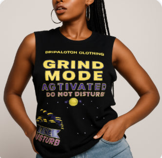 Person wearing a black tank top with colorful text and graphics on a light gray background